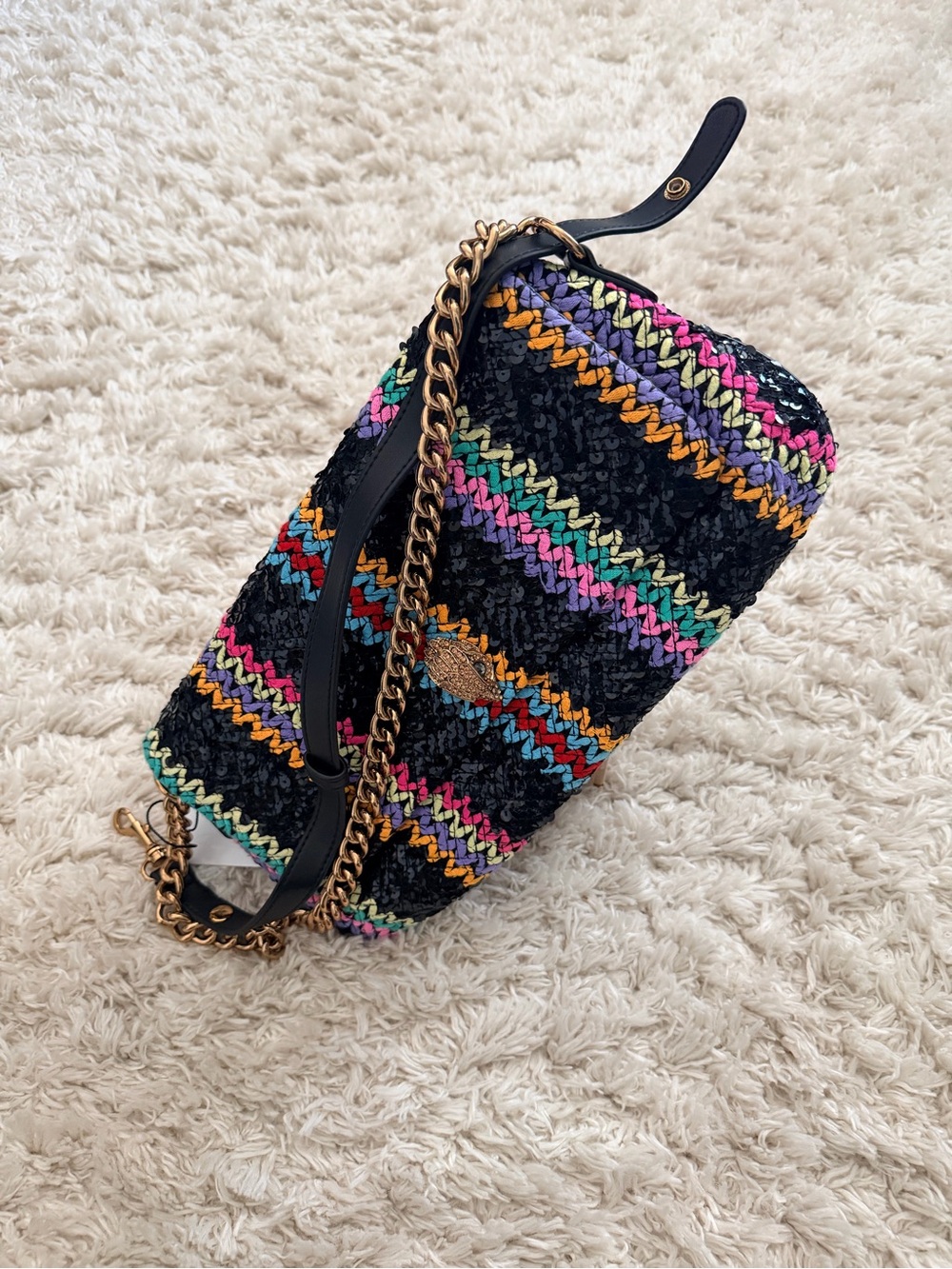 Kurt Geiger Black Woven Shoulder Bag with Gold Chain and Multicolor Stripes